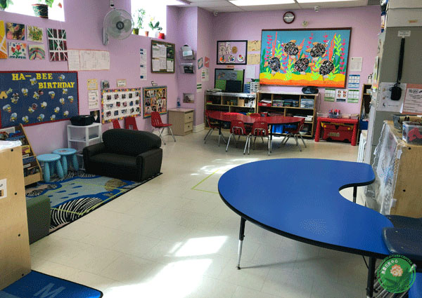 Intermediate room activity table and reading area.
